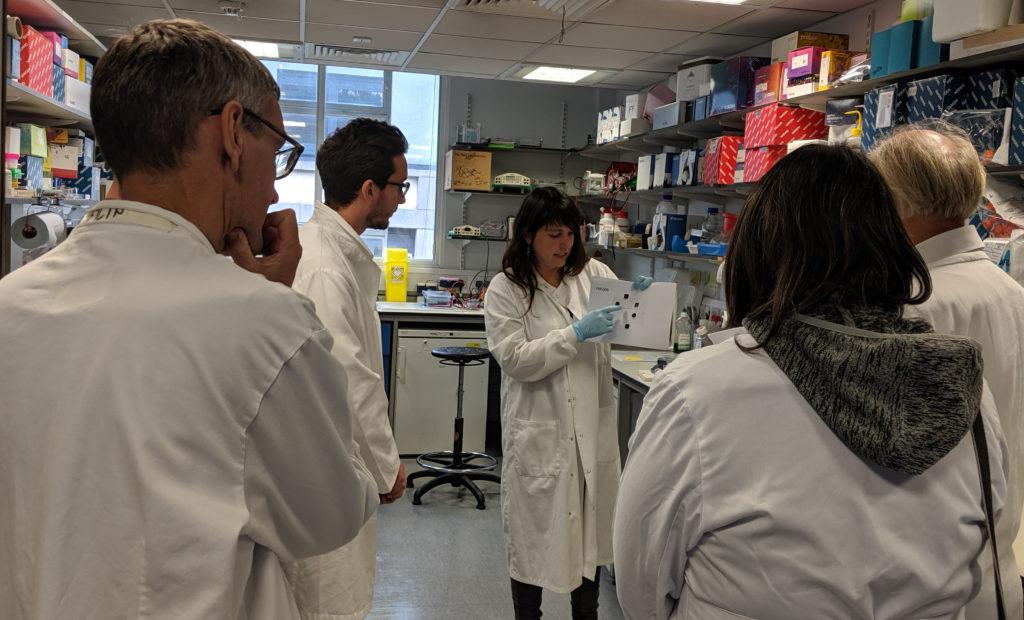 Dr Ana Rio-Machin explaining her work on familial leukaemia as part of the Bloodwise laboratory tour.